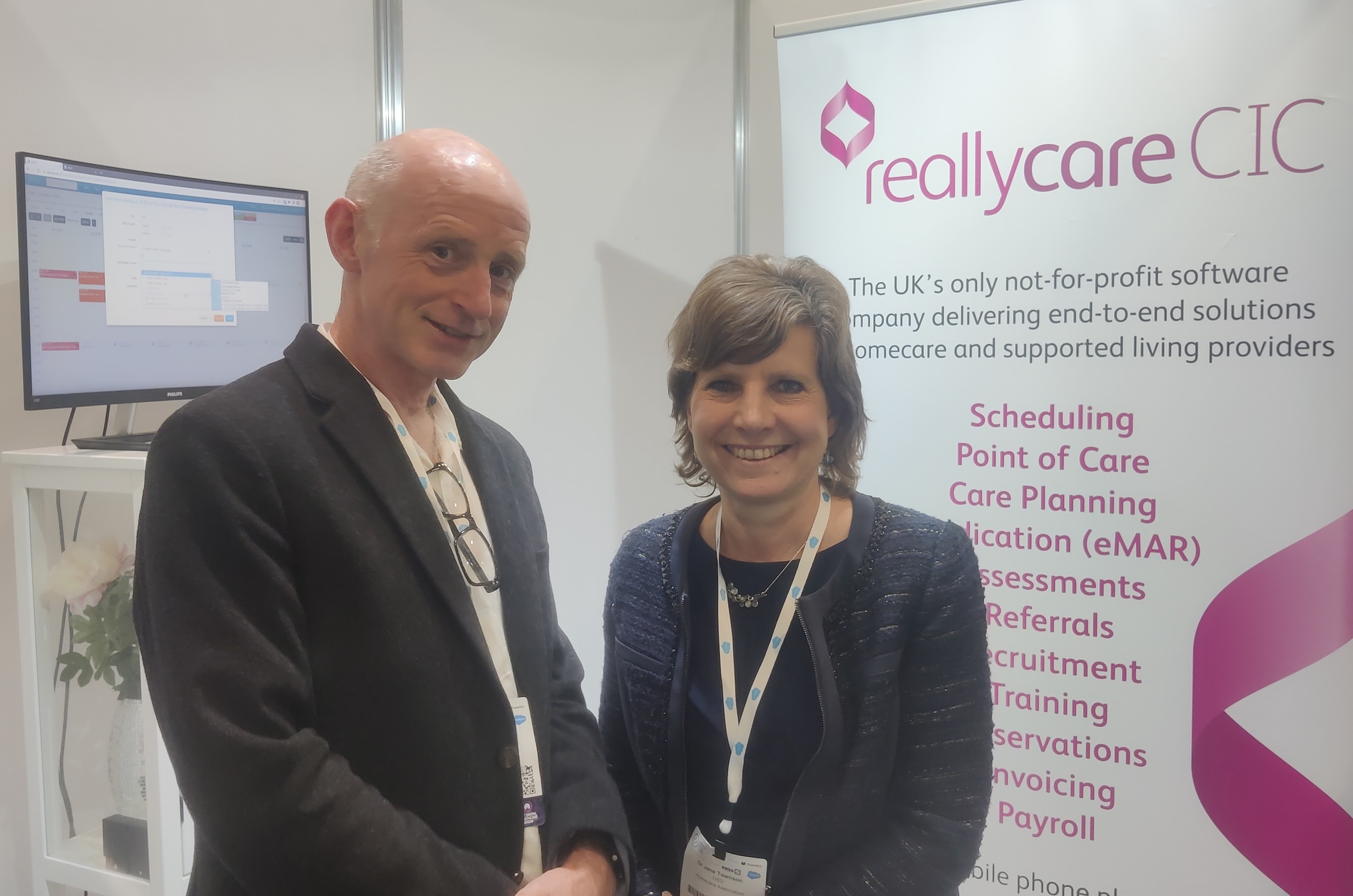 Mark Chapman welcomes Jane Townson, CEO, Care Association to the ReallyCare stand